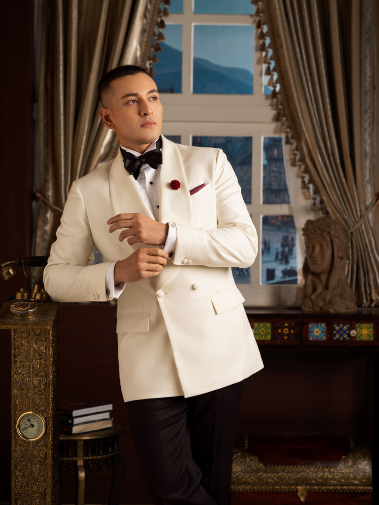 A bespoke ivory dinner jacket made at The Suit Studio